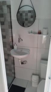 Ένα μπάνιο στο Suíte Standard Privado