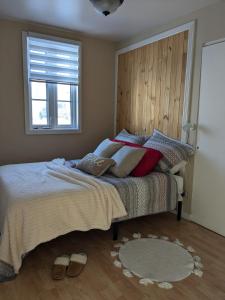 Postel nebo postele na pokoji v ubytování La belle ancestrale