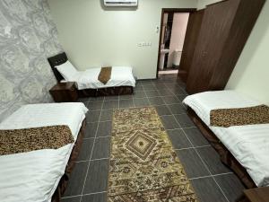 Postel nebo postele na pokoji v ubytování شقق فندقيه