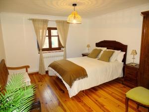 Postel nebo postele na pokoji v ubytování Casa rural El Herrero + 23 fotografií