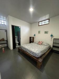 Ένα ή περισσότερα κρεβάτια σε δωμάτιο στο Casa Tuanis, Drake Bay