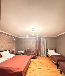 Postel nebo postele na pokoji v ubytování Apartment Once in Kazbegi