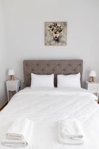 Postel nebo postele na pokoji v ubytování Santa Marina 10