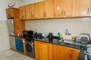 Η κουζίνα ή μικρή κουζίνα στο Siri's Home +3 φωτογραφίες