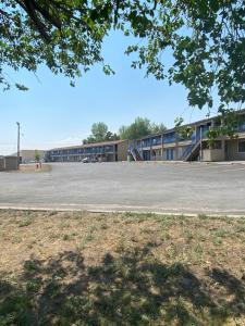 an empty parking lot in front of a building at Barton's Club 93 in Jackpot