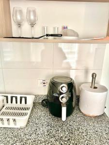 Köök või kööginurk majutusasutuses Aparthotel Urbano 2 habitaciones hasta 6 personas CC Fundadores U Autonoma