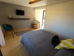 Televiisor ja/või meelelahutuskeskus majutusasutuses Finca del Pomar