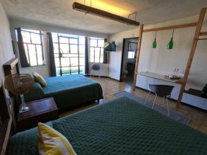 Voodi või voodid majutusasutuse Finca del Pomar toas