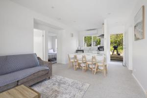 a living room with a couch and a table at Peaceful 2-Bed Apartment in Coastal McCrae in McCrae