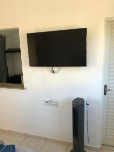 TV a/nebo společenská místnost v ubytování Kitnet em Araras