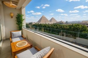 Balkón nebo terasa v ubytování ONE GATE Pyramids View INN