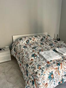 Giường trong phòng chung tại Da Zia Maria