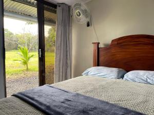 Postel nebo postele na pokoji v ubytování Little Paradise