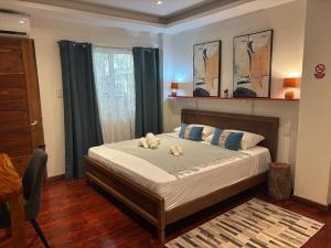 Ένα ή περισσότερα κρεβάτια σε δωμάτιο στο Spacious 2 Puntakana apartelle