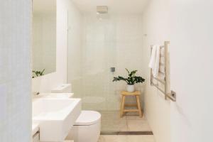 Ένα μπάνιο στο ON THE Rocks - Yamba's Ultimate Absolute Beachdirft Residence