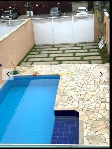 Swimmingpoolen hos eller tæt på Casa Piscina Temporada Jd Sao Lourenço