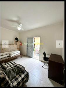 En eller flere senge i et værelse på Casa Piscina Temporada Jd Sao Lourenço