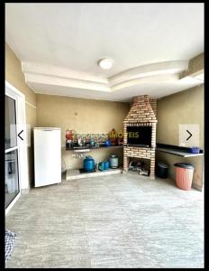 Køkken eller tekøkken på Casa Piscina Temporada Jd Sao Lourenço