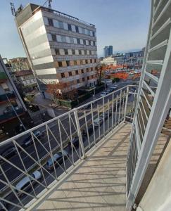 a view of a city from a balcony of a building at Cozy apartment near downtown in Turin