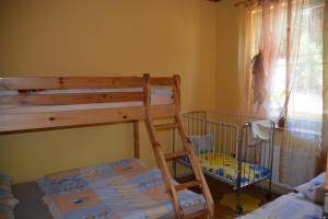 Postel nebo postele na pokoji v ubytování Areal Hradišek