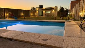 Bazén v ubytování Departamento por dia nebo v jeho okolí