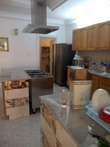 Kuchyň nebo kuchyňský kout v ubytování PG's apartments