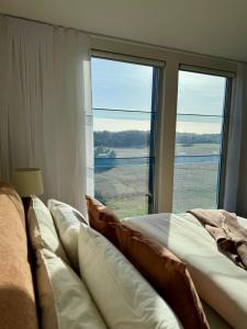 Ένα ή περισσότερα κρεβάτια σε δωμάτιο στο The Retreat at St Andrews Beach Golf Course