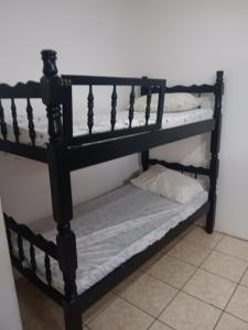 a couple of bunk beds in a room at Camping camping in Antigua Guatemala