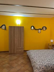 Ένα ή περισσότερα κρεβάτια σε δωμάτιο στο B&B il Parco stanza Santa Croce +1 φωτογραφίες