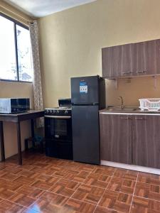 Nhà bếp/bếp nhỏ tại Tikaaaj House Ideal para 3 o 4 personas +3 ảnh