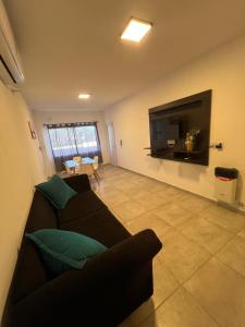 TV a/nebo společenská místnost v ubytování Estilo City