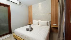 Ένα ή περισσότερα κρεβάτια σε δωμάτιο στο Mahesa Seminyak +29 φωτογραφίες