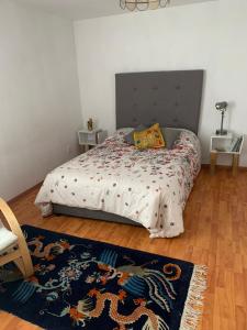 Ένα ή περισσότερα κρεβάτια σε δωμάτιο στο Casa Dos Hermanas +34 φωτογραφίες