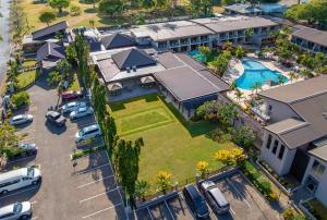 an aerial view of a house with a yard at Tanoa Waterfront Hotel in Lautoka