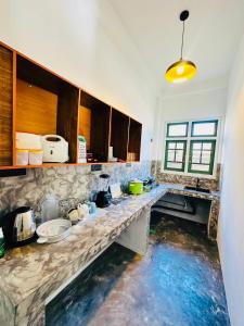 Η κουζίνα ή μικρή κουζίνα στο Villa Vows