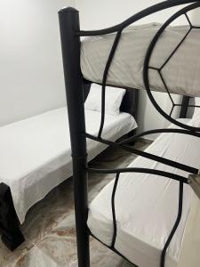 Postel nebo postele na pokoji v ubytování Casa Linda