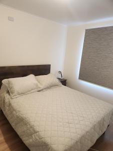 Postel nebo postele na pokoji v ubytování Casa San José de la Mariquina Urban Sector