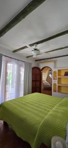 Ένα ή περισσότερα κρεβάτια σε δωμάτιο στο Villa Sandy en Samara Rocks