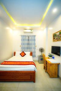 Giường trong phòng chung tại Hồng 68 Motel