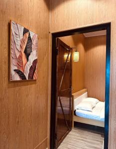 Postel nebo postele na pokoji v ubytování Giăng's House Farmstay & Glamping