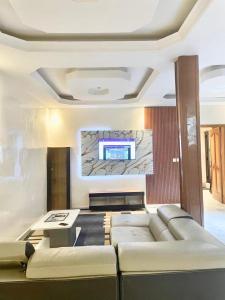 Ένα ή περισσότερα κρεβάτια σε δωμάτιο στο Meublé au bord de la mer à Dakar Sénégal