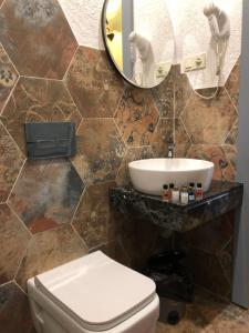 Koupelna v ubytování Renaissance Boutique Hotel + 25 fotografií