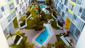 Bazén v ubytování Apartment in Punta Cana nebo v jeho okolí