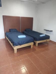 En eller flere senge i et værelse på Jardines del Mar by La Cultura Suites - Boutique Studios Playa del Carmen + 38 billeder