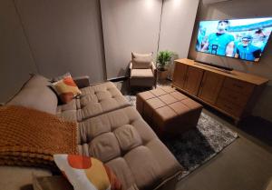 Posezení v ubytování SKYHOUSE BOUTIQUE - Loft & SPA - piscina aquecida e sauna privativa - Centro, Domingos Martins