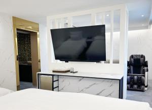 Μια τηλεόραση ή/και κέντρο ψυχαγωγίας στο Dongdaemun Signature Tourist Hotel +66 φωτογραφίες