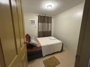 Postel nebo postele na pokoji v ubytování KozySpace + 9 fotografií