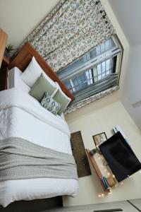 Ένα ή περισσότερα κρεβάτια σε δωμάτιο στο The chakra luxury stay