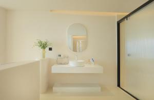 Ένα μπάνιο στο Dali Guyue Sea View Villa +25 φωτογραφίες