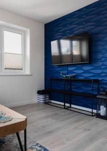 Et tv og/eller underholdning på LuxCity Apartment + 20 billeder